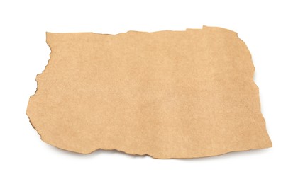 Photo of Piece of old paper with dark burnt borders isolated on white