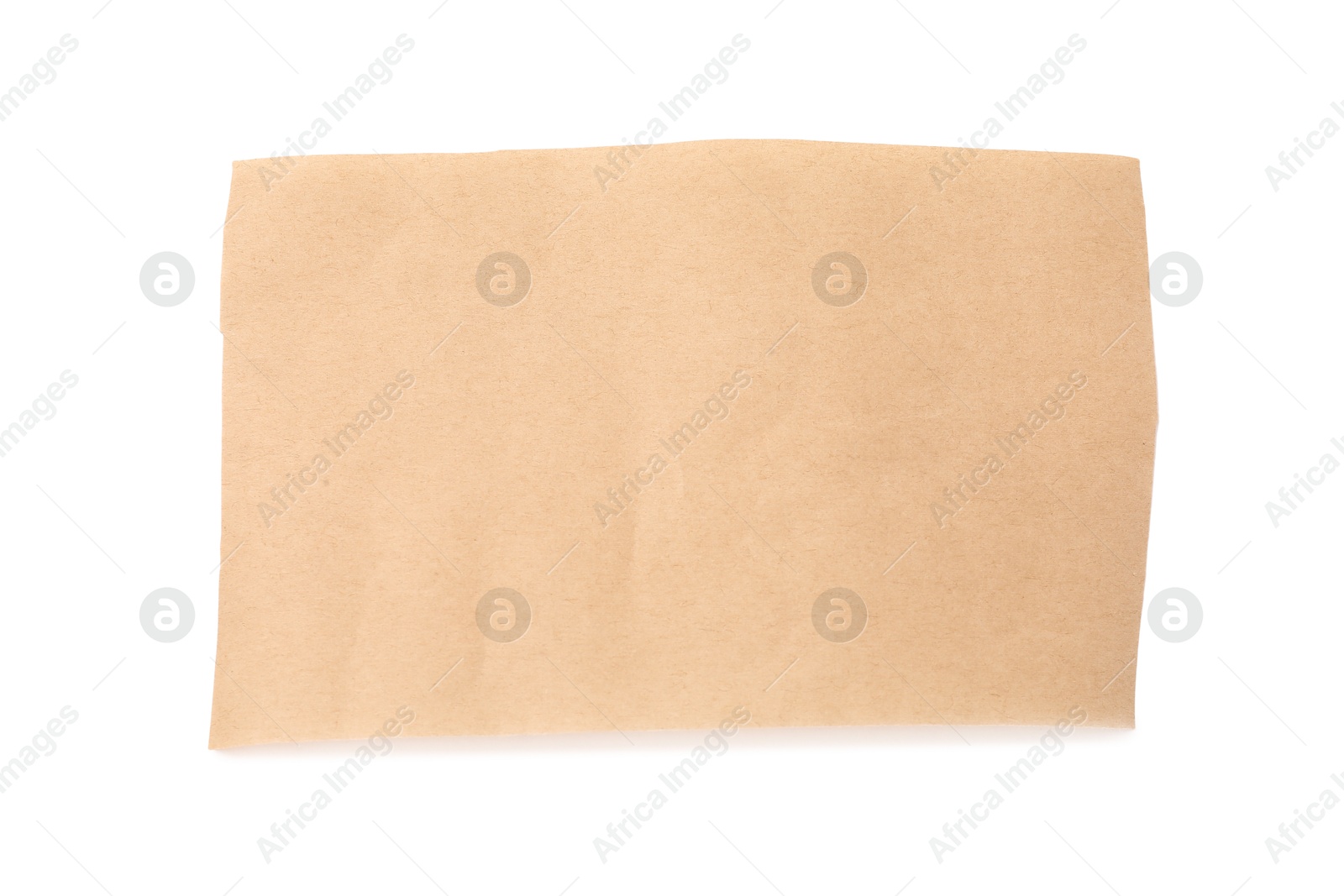 Photo of Kraft paper sheet isolated on white, top view