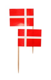 Small paper flags of Denmark isolated on white