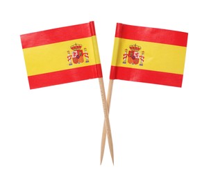 Small paper flags of Spain isolated on white