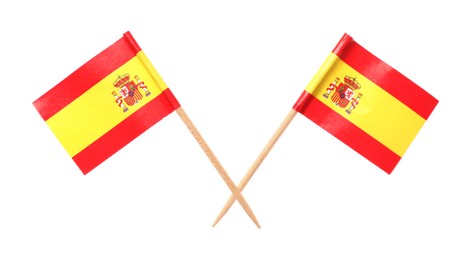 Small paper flags of Spain isolated on white