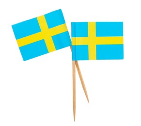 Small paper flags of Sweden isolated on white