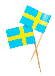 Photo of Small paper flags of Sweden isolated on white