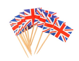 Photo of Small paper flags of United Kingdom isolated on white