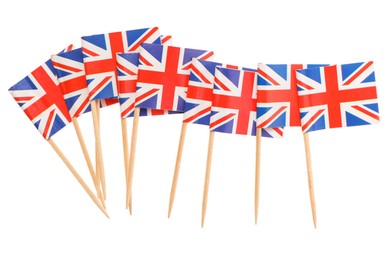 Small paper flags of United Kingdom isolated on white