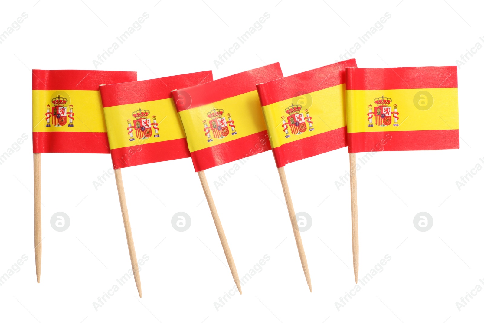 Photo of Small paper flags of Spain isolated on white