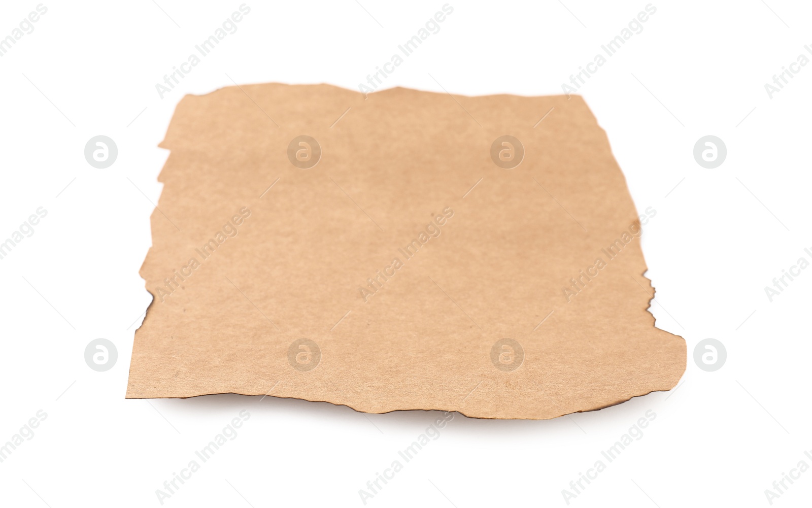 Photo of Old kraft paper with dark burnt borders isolated on white