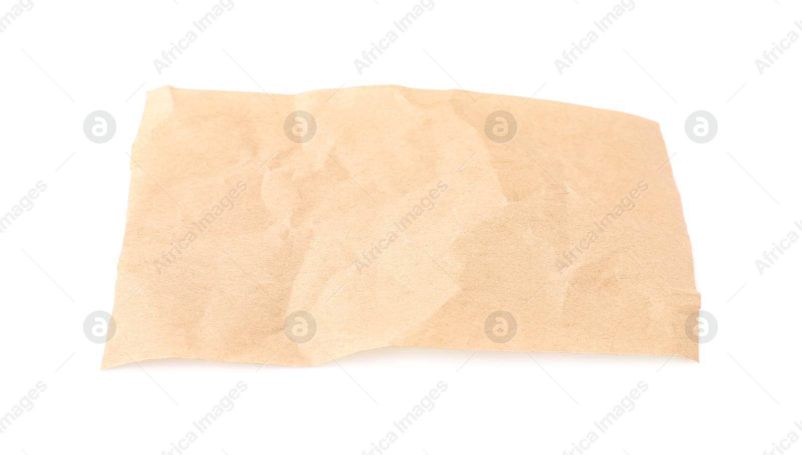 Photo of Crumpled kraft paper sheet isolated on white