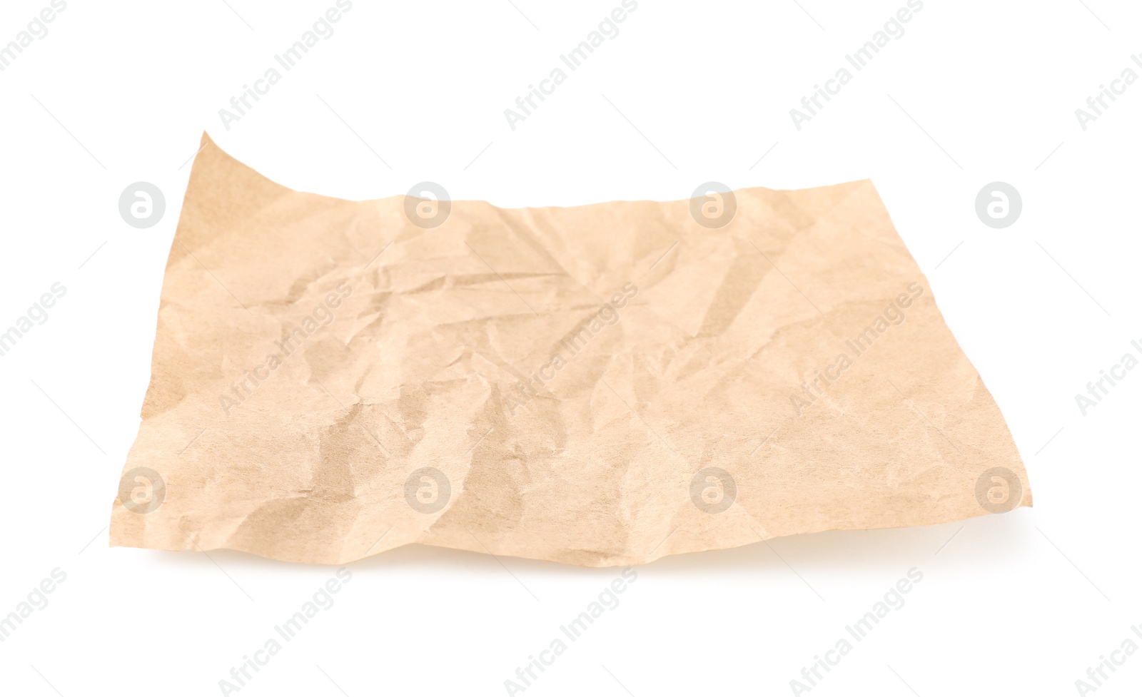 Photo of Crumpled kraft paper sheet isolated on white