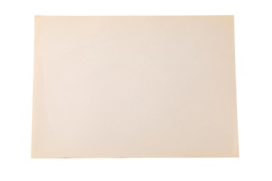 Photo of One old paper sheet isolated on white, top view