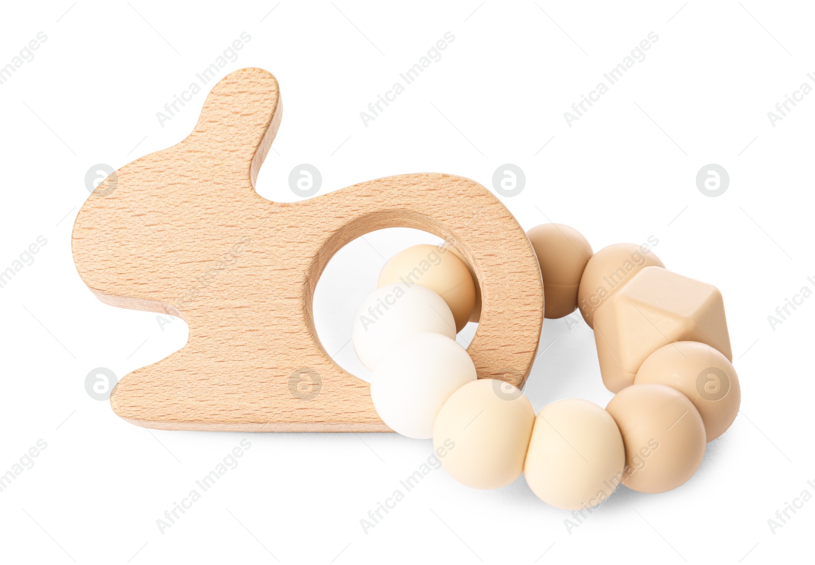 Photo of Wooden rattle isolated on white. Baby accessory]