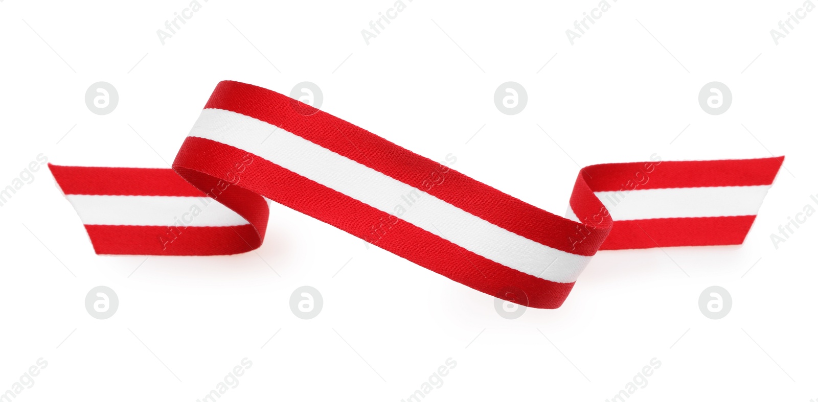 Photo of Ribbon in colors of Austrian flag isolated on white, top view