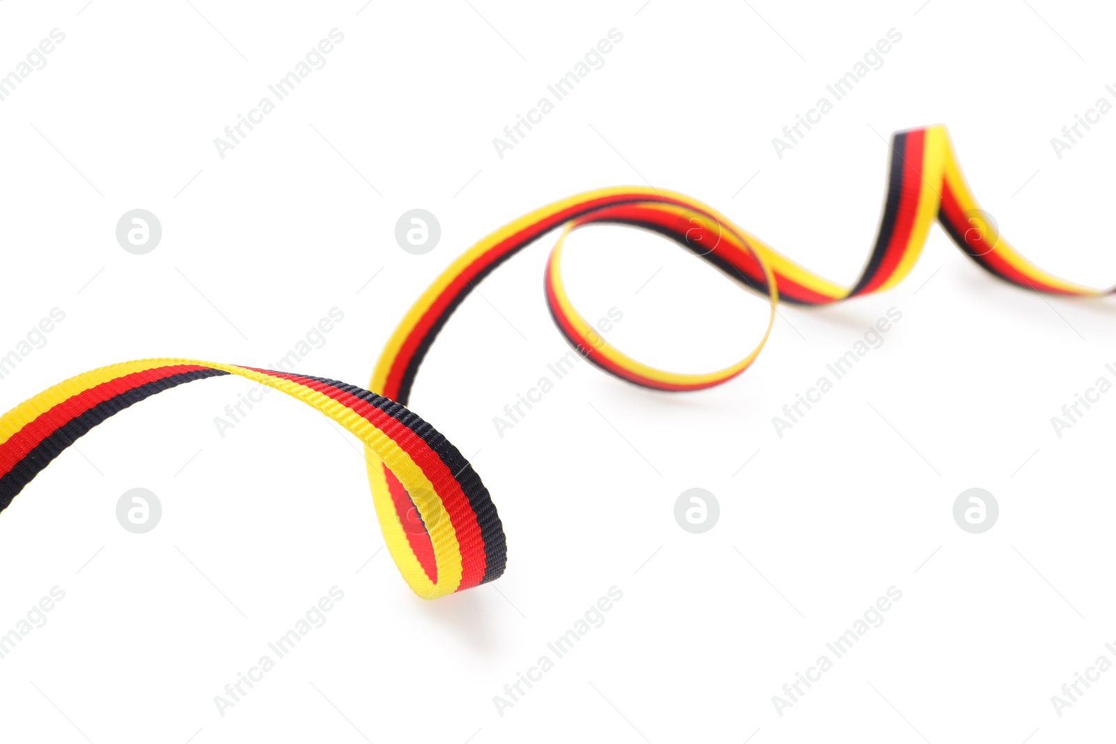 Photo of Ribbon in colors of German flag isolated on white