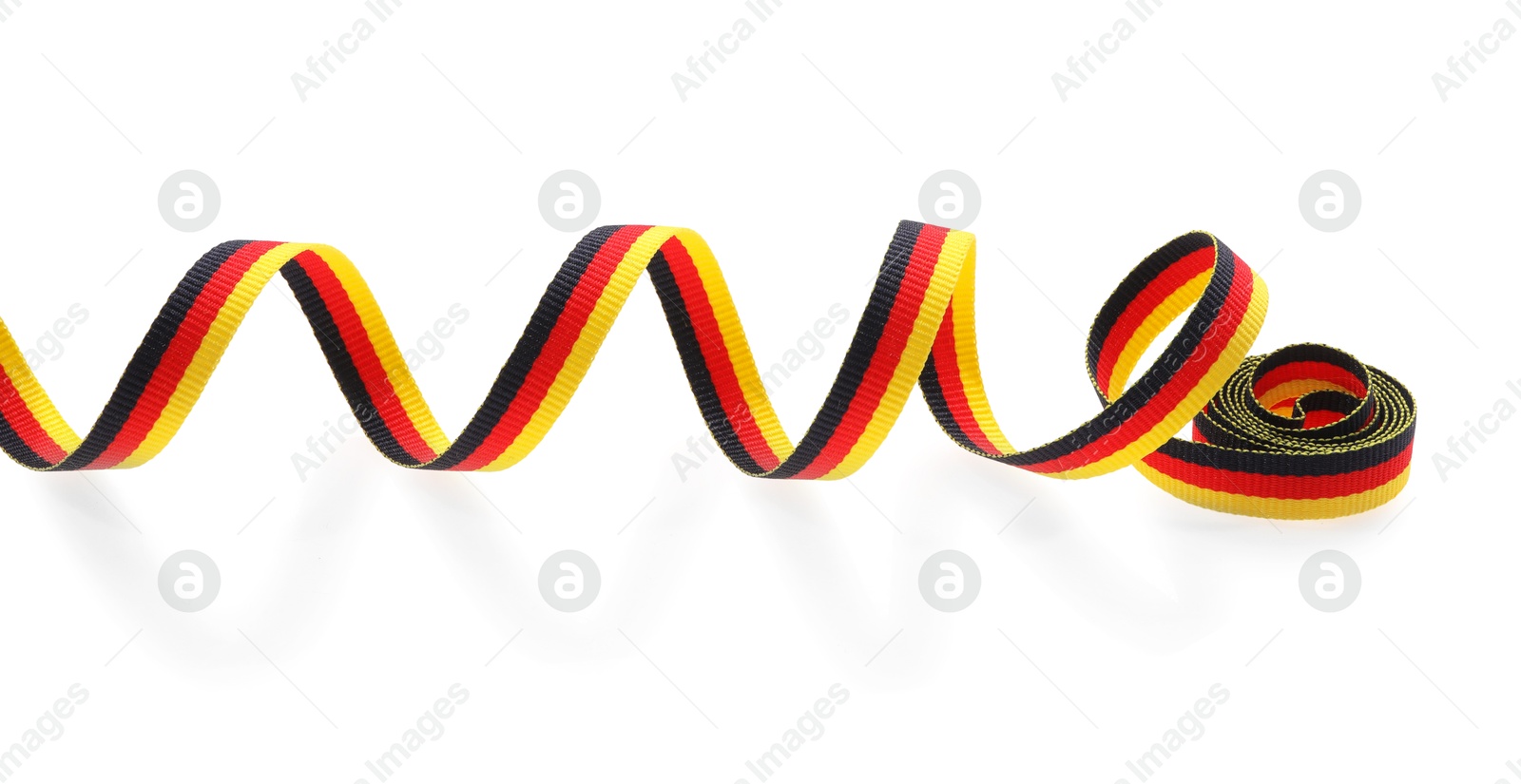 Photo of Ribbon in colors of German flag isolated on white