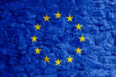 Image of Flag of European Union on stone wall