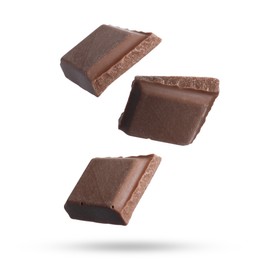 Image of Pieces of sweet chocolate falling on white background