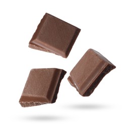 Image of Pieces of sweet chocolate falling on white background