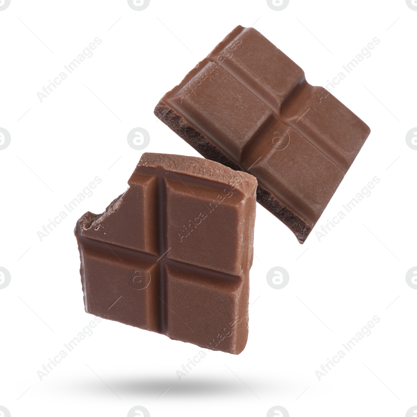 Image of Pieces of sweet chocolate falling on white background