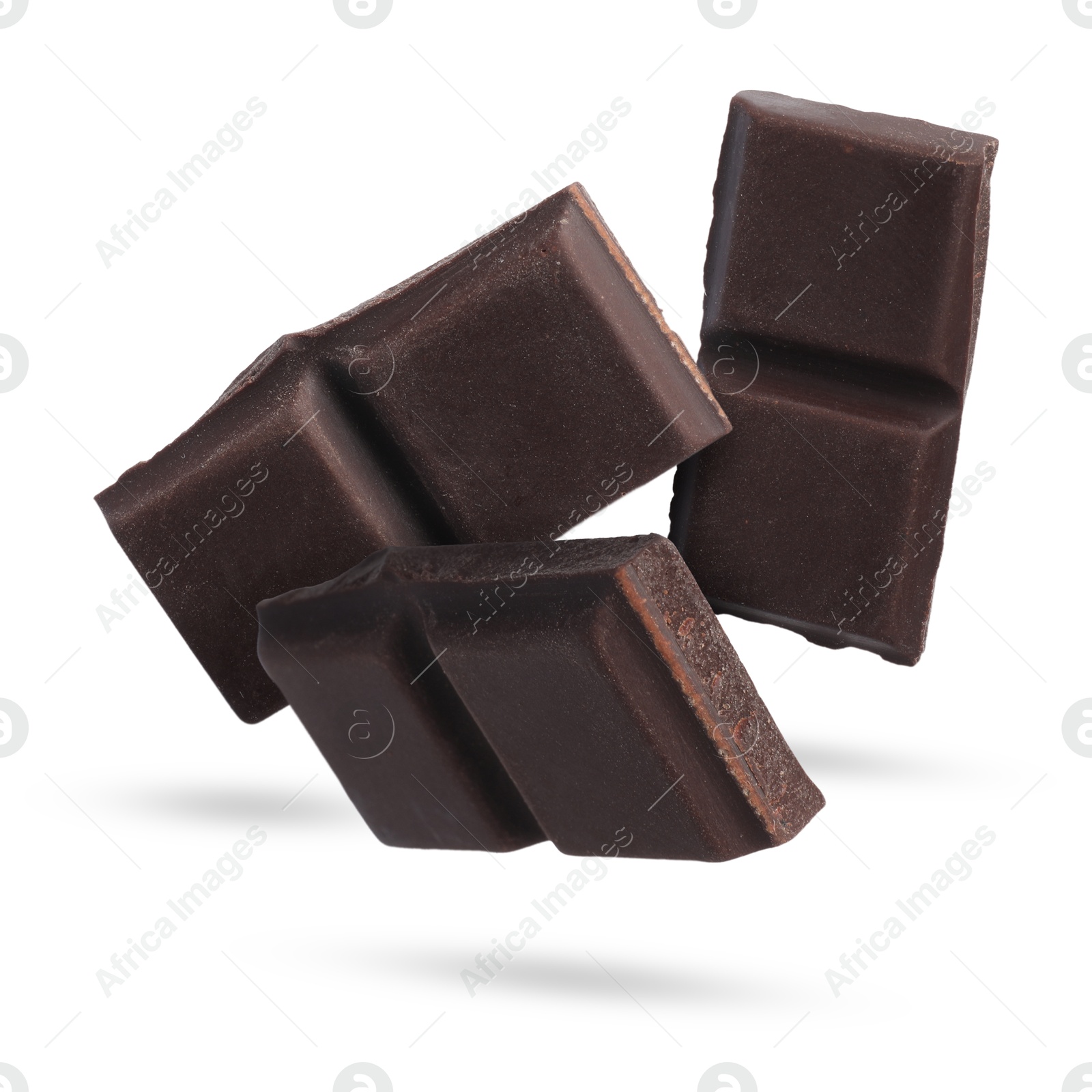 Image of Pieces of sweet chocolate falling on white background