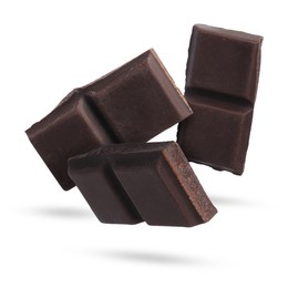 Image of Pieces of sweet chocolate falling on white background