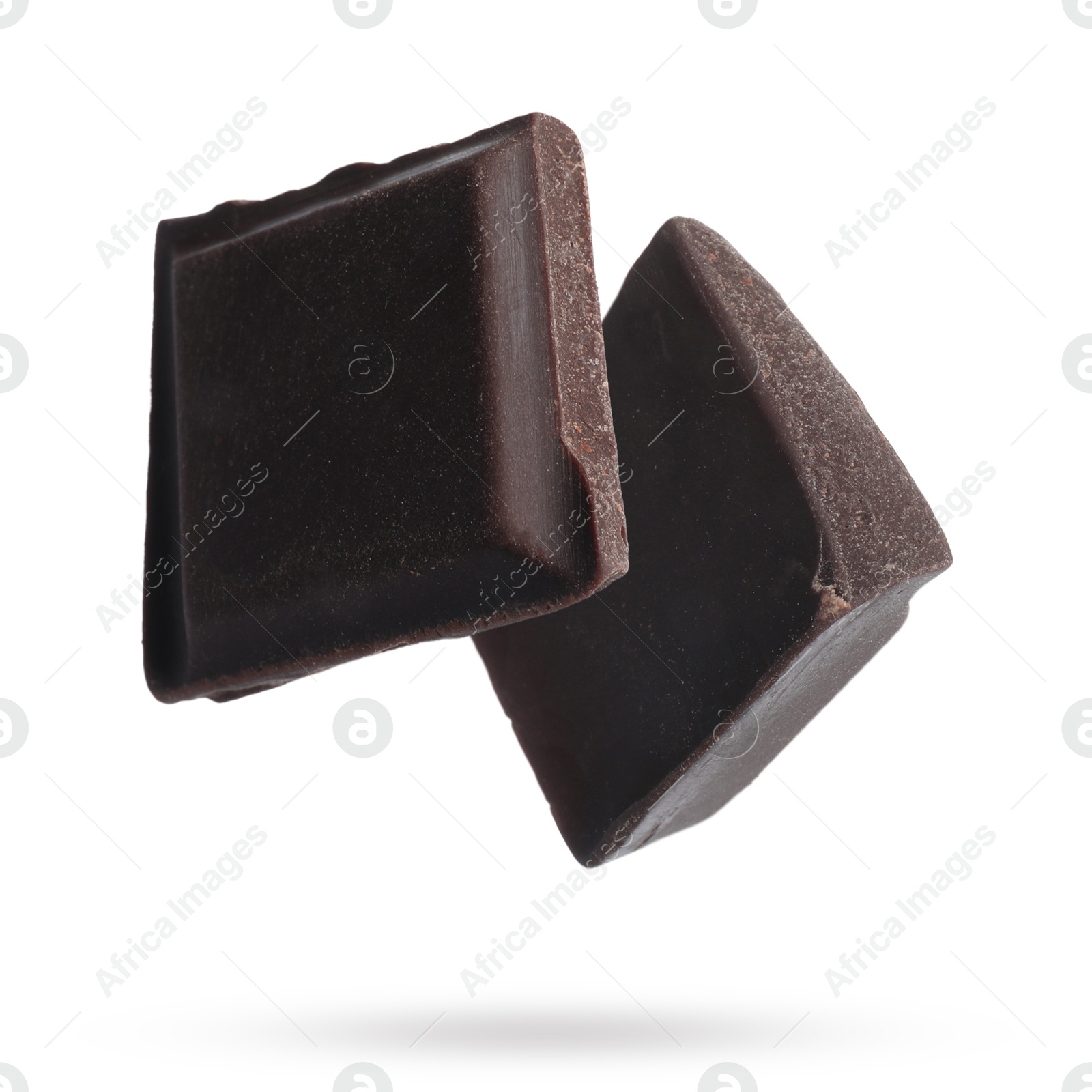 Image of Pieces of sweet chocolate falling on white background