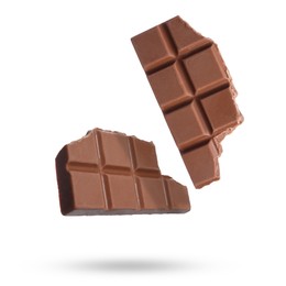 Image of Pieces of sweet chocolate falling on white background