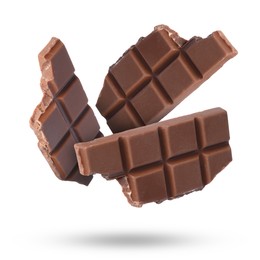 Image of Pieces of sweet chocolate falling on white background