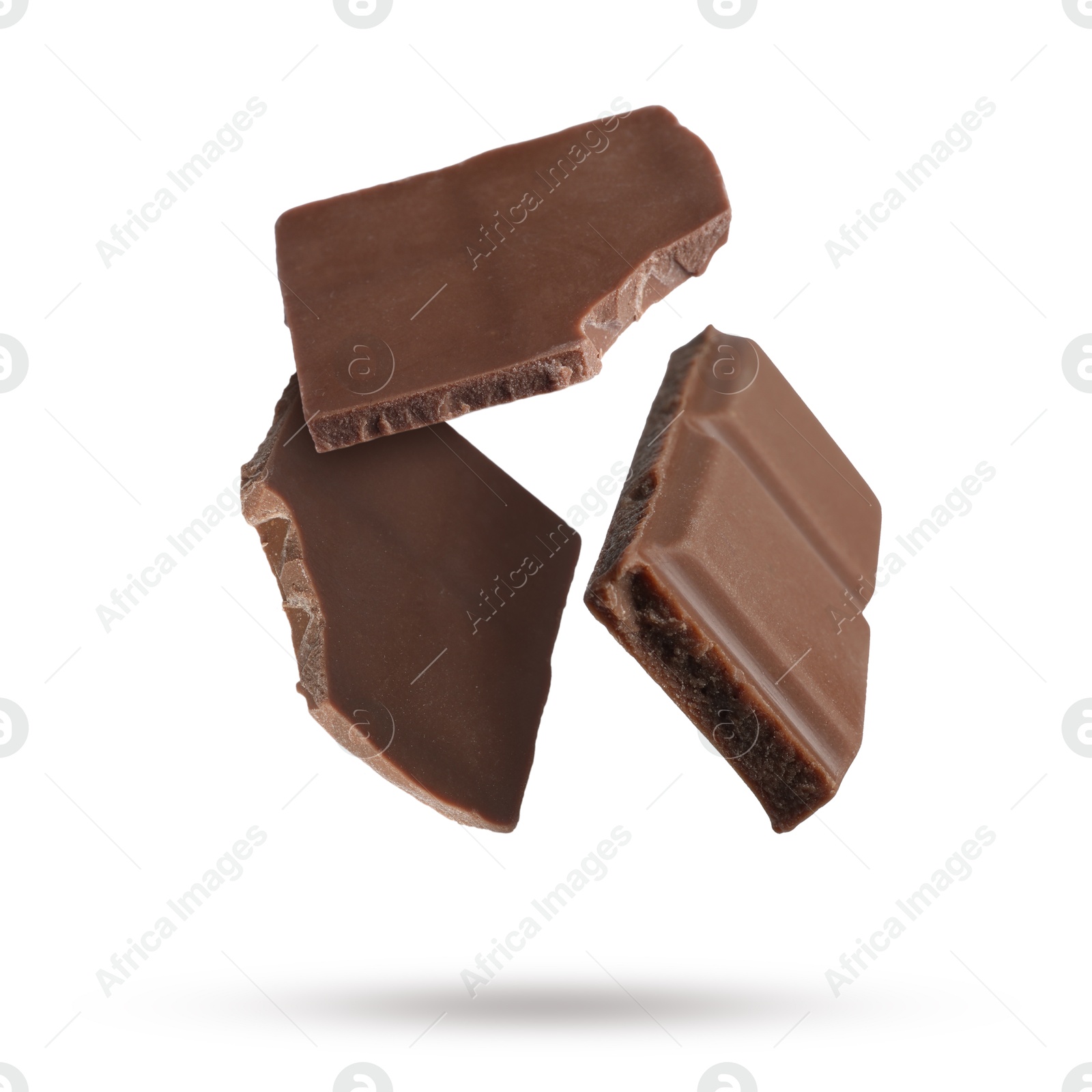 Image of Pieces of sweet chocolate falling on white background