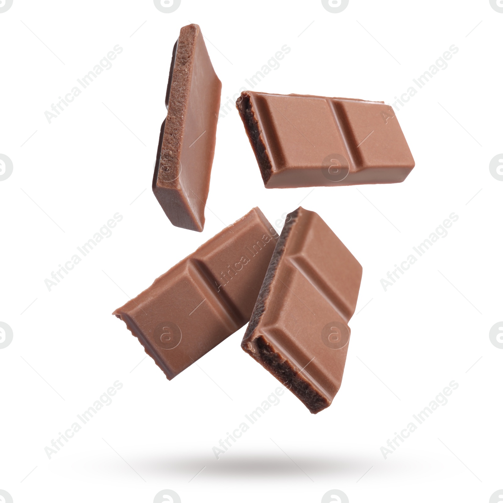 Image of Pieces of sweet chocolate falling on white background