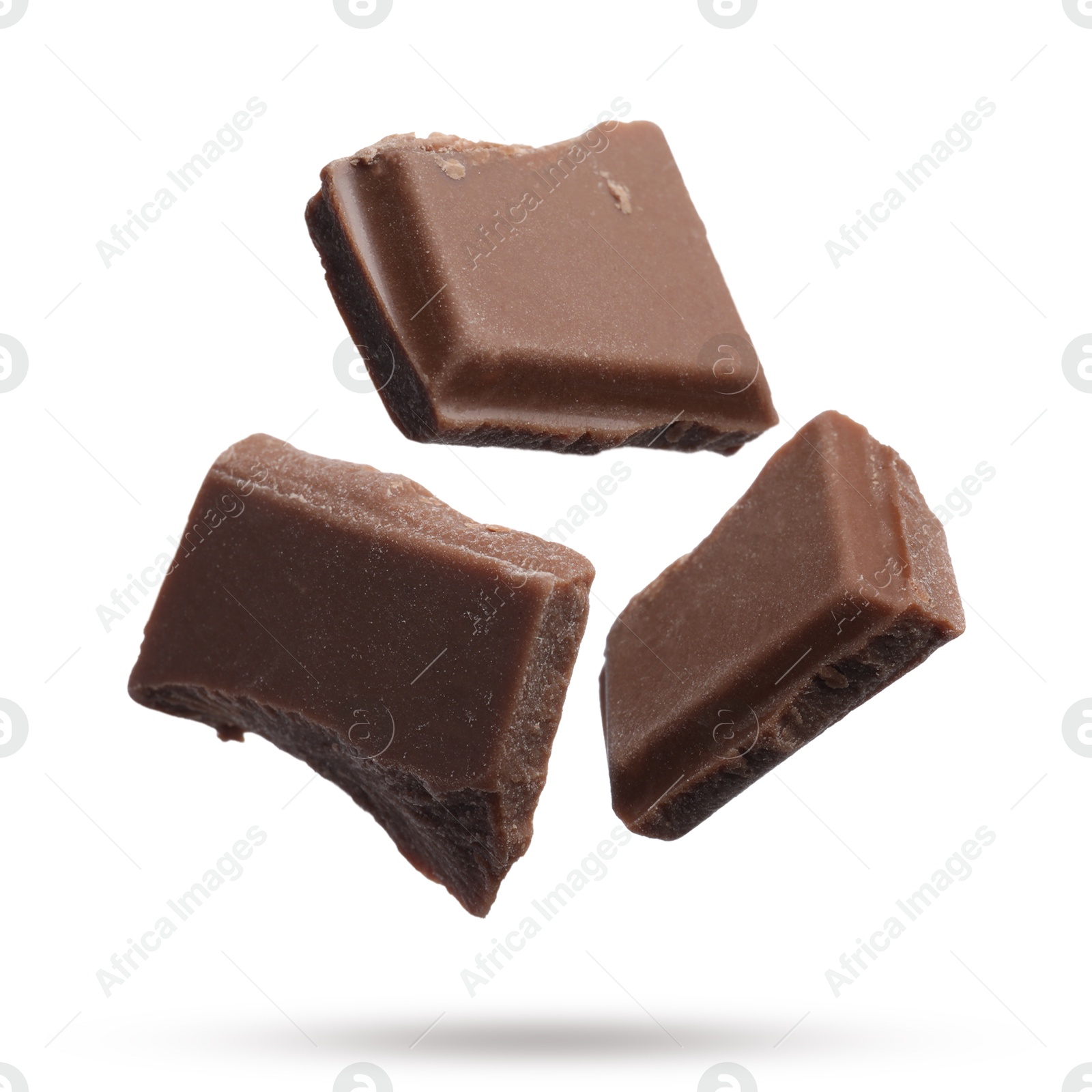 Image of Pieces of sweet chocolate falling on white background