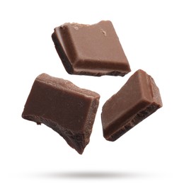 Image of Pieces of sweet chocolate falling on white background