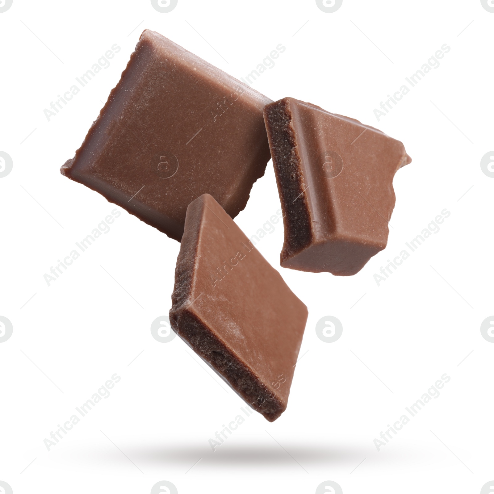 Image of Pieces of sweet chocolate falling on white background