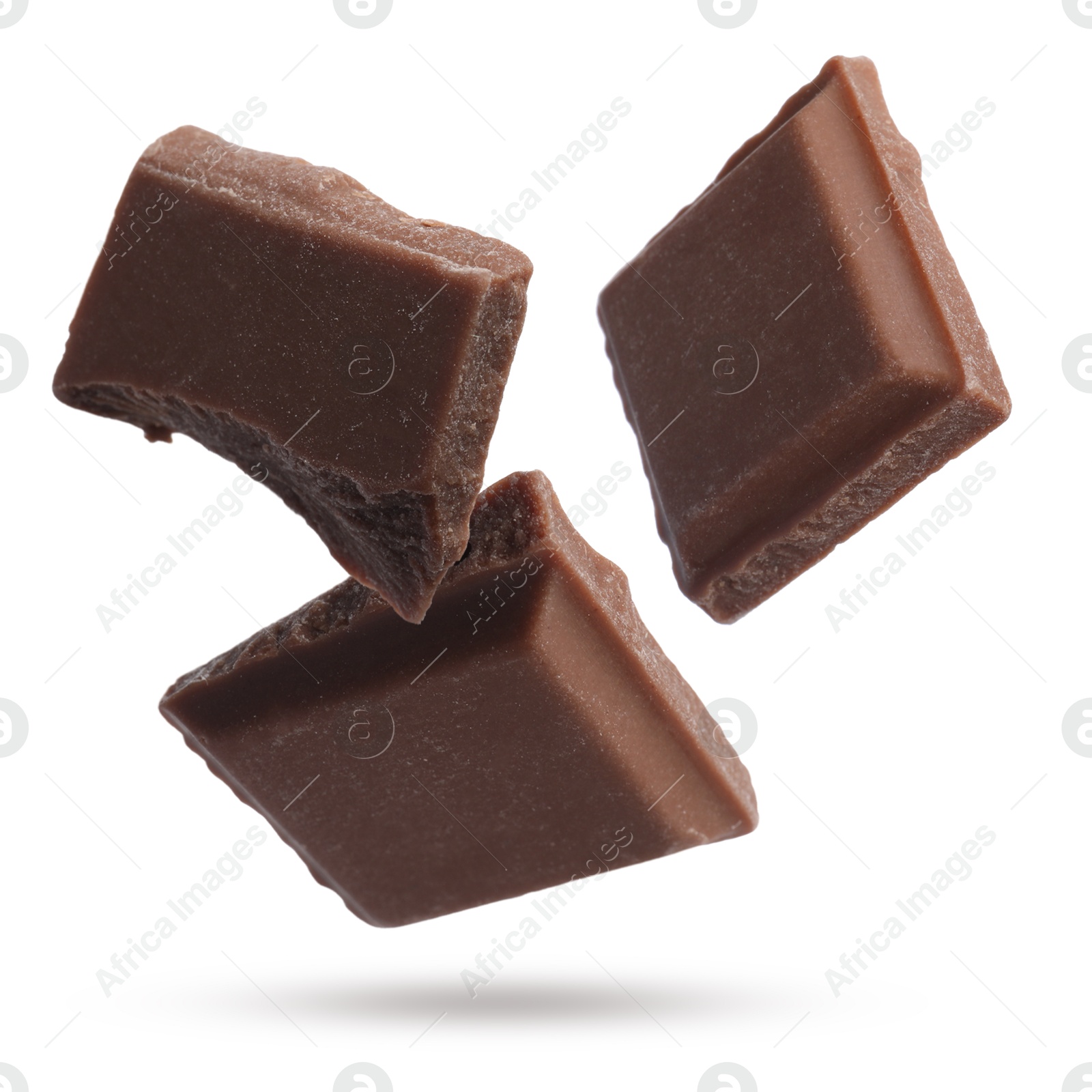 Image of Pieces of sweet chocolate falling on white background