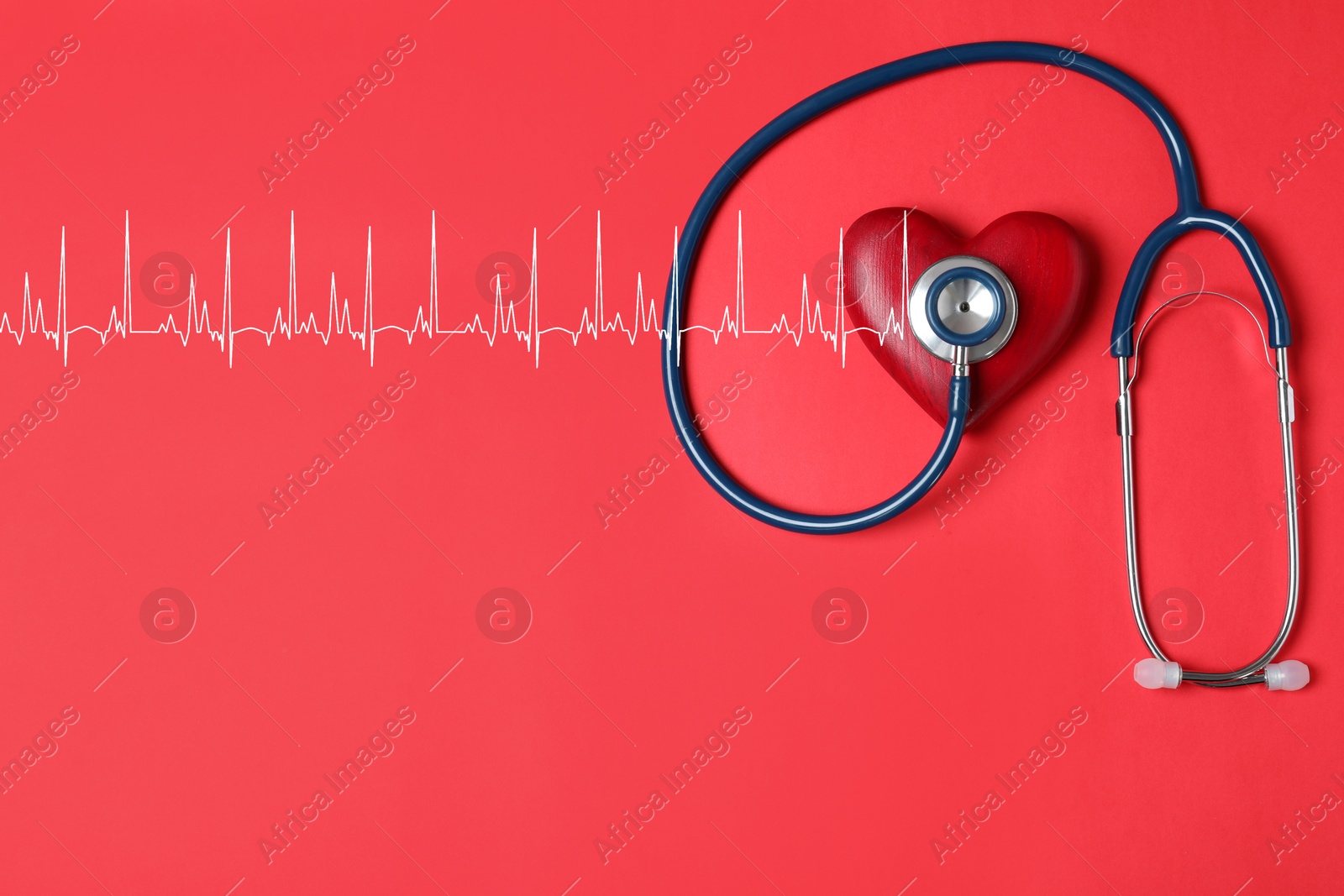 Image of Decorative heart, stethoscope and electrocardiogram on red background, top view