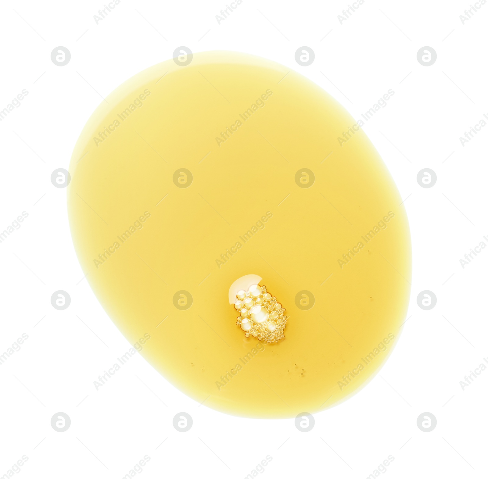 Photo of Essential oil drop isolated on white, top view. Cosmetic product