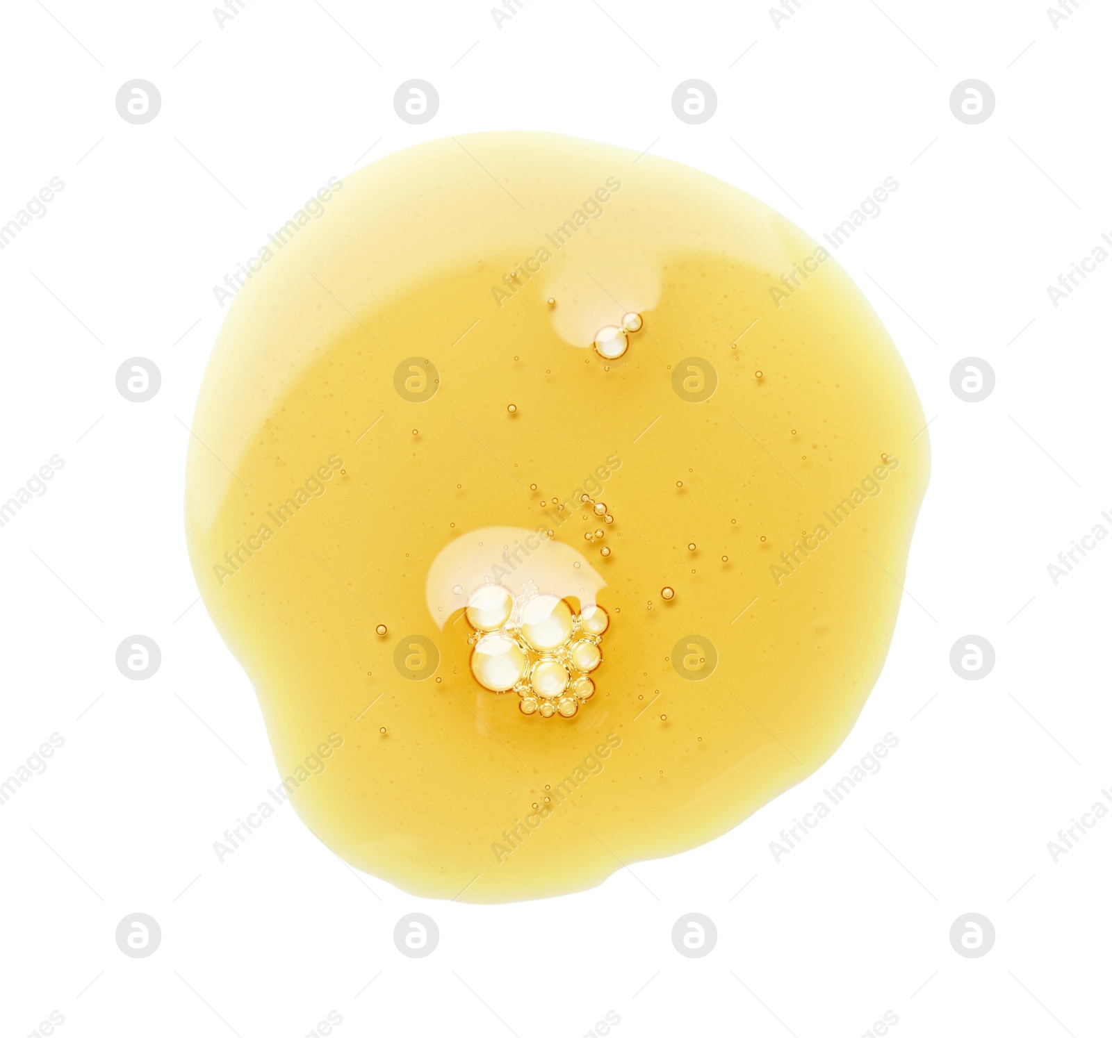 Photo of Essential oil drop isolated on white, top view. Cosmetic product