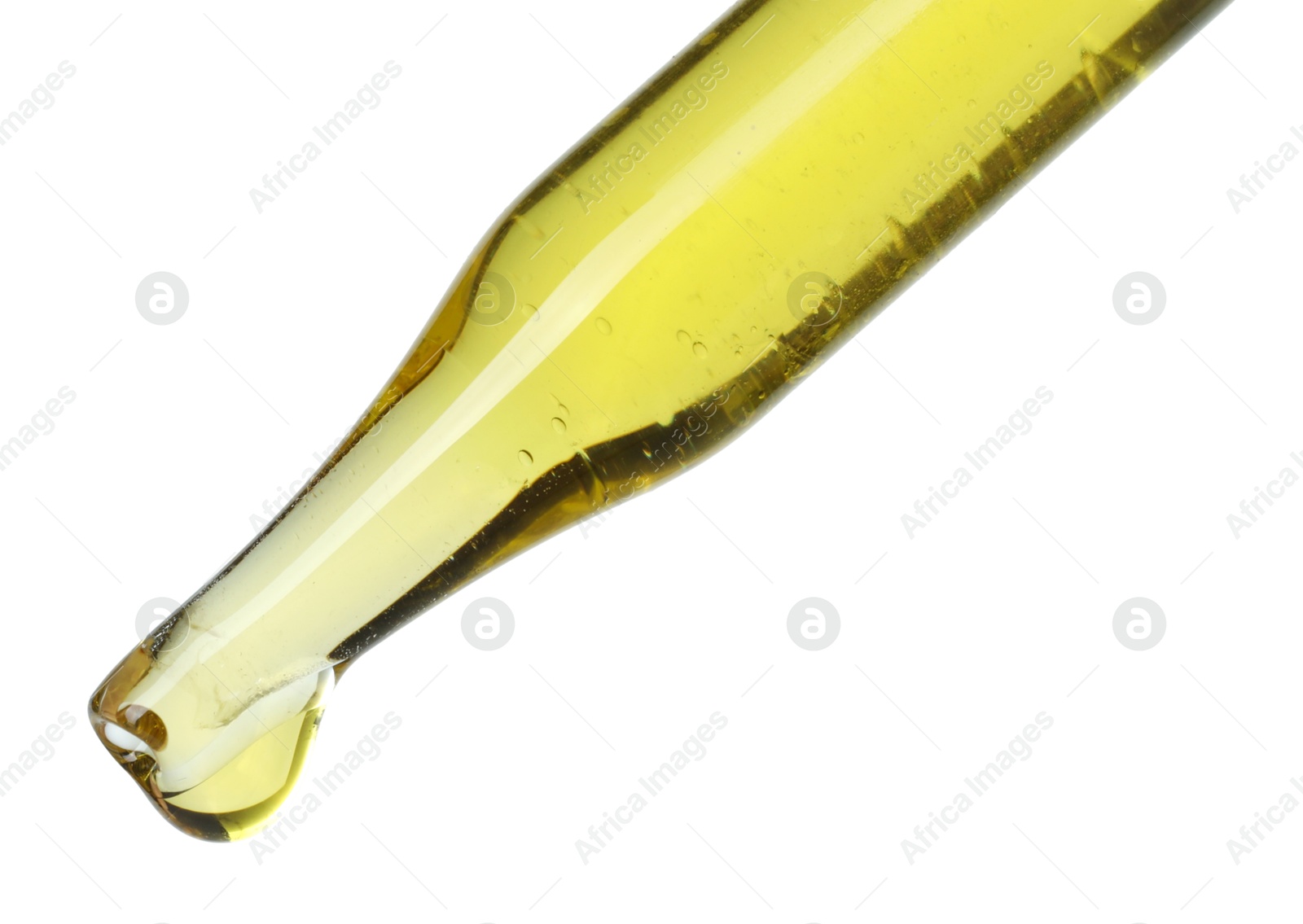 Photo of Dripping essential oil from pipette on white background