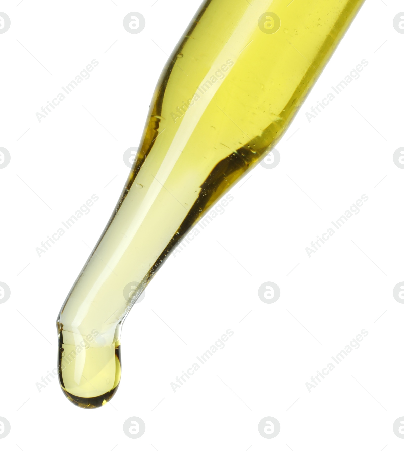 Photo of Dripping essential oil from pipette on white background