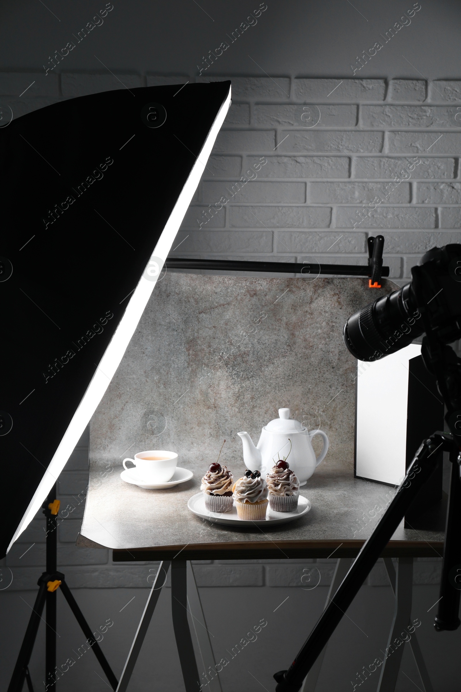 Photo of Shooting food in photo studio with professional lighting equipment