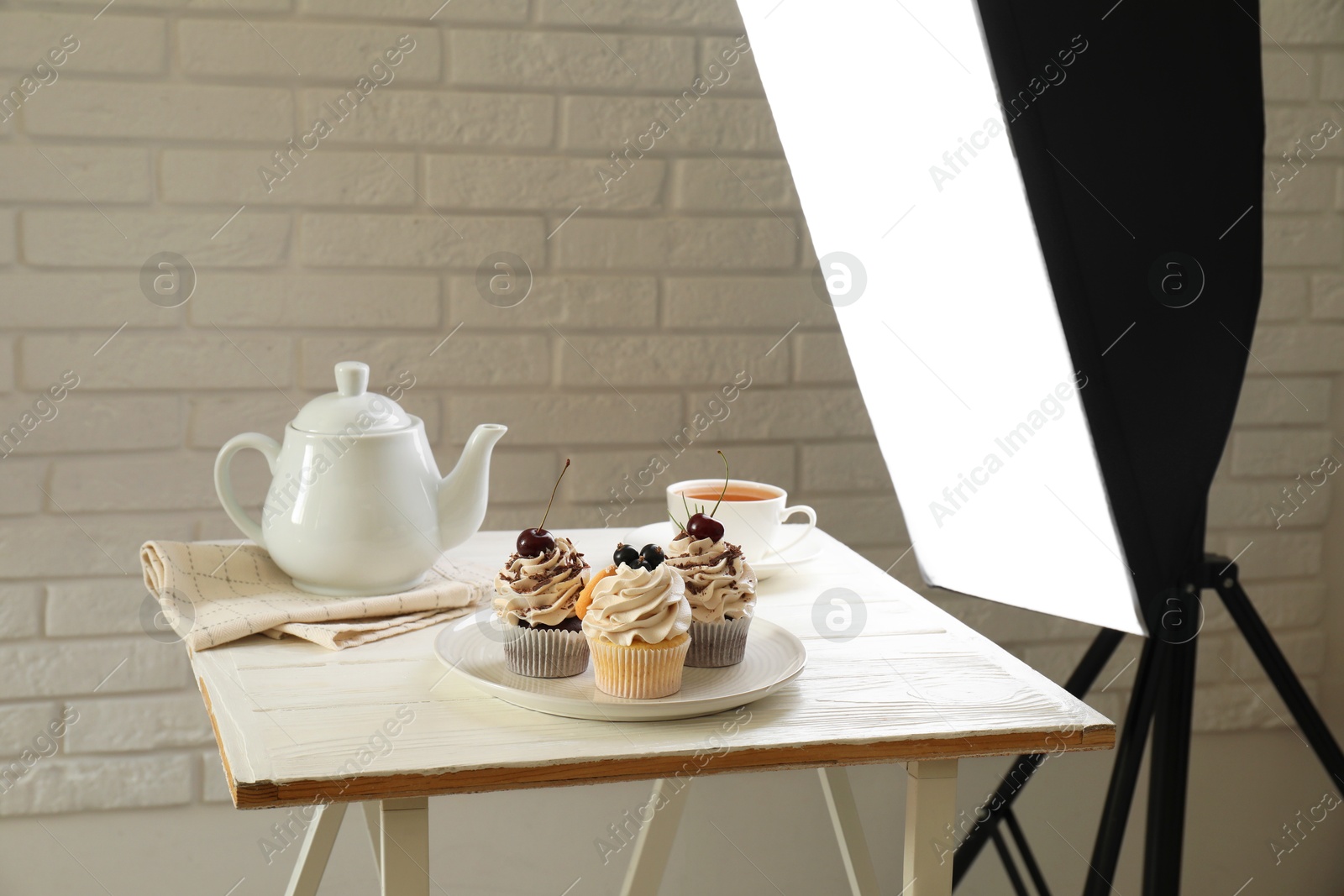 Photo of Shooting food in photo studio with professional lighting equipment