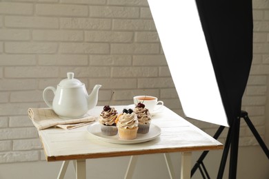 Photo of Shooting food in photo studio with professional lighting equipment