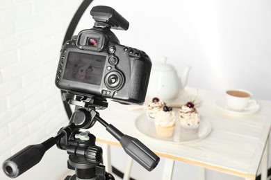 Photo of Shooting food with professional camera in photo studio, selective focus