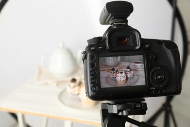 Photo of Shooting food with professional camera in photo studio, selective focus