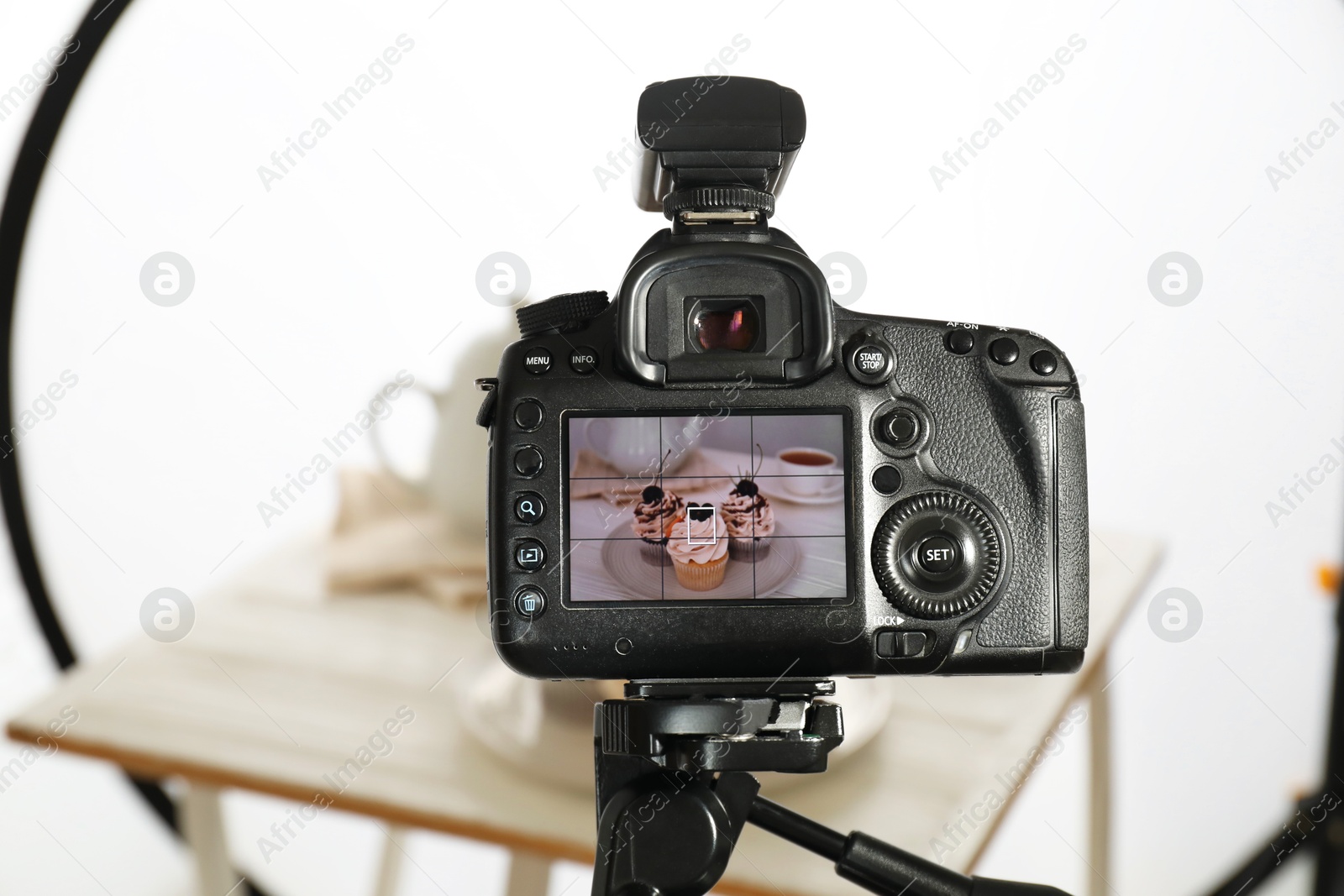 Photo of Shooting food with professional camera in photo studio, selective focus