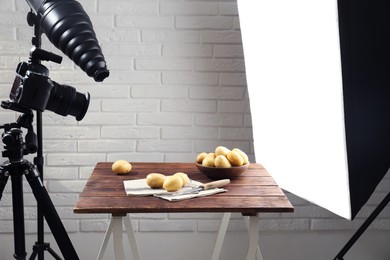 Shooting food in photo studio with professional lighting equipment