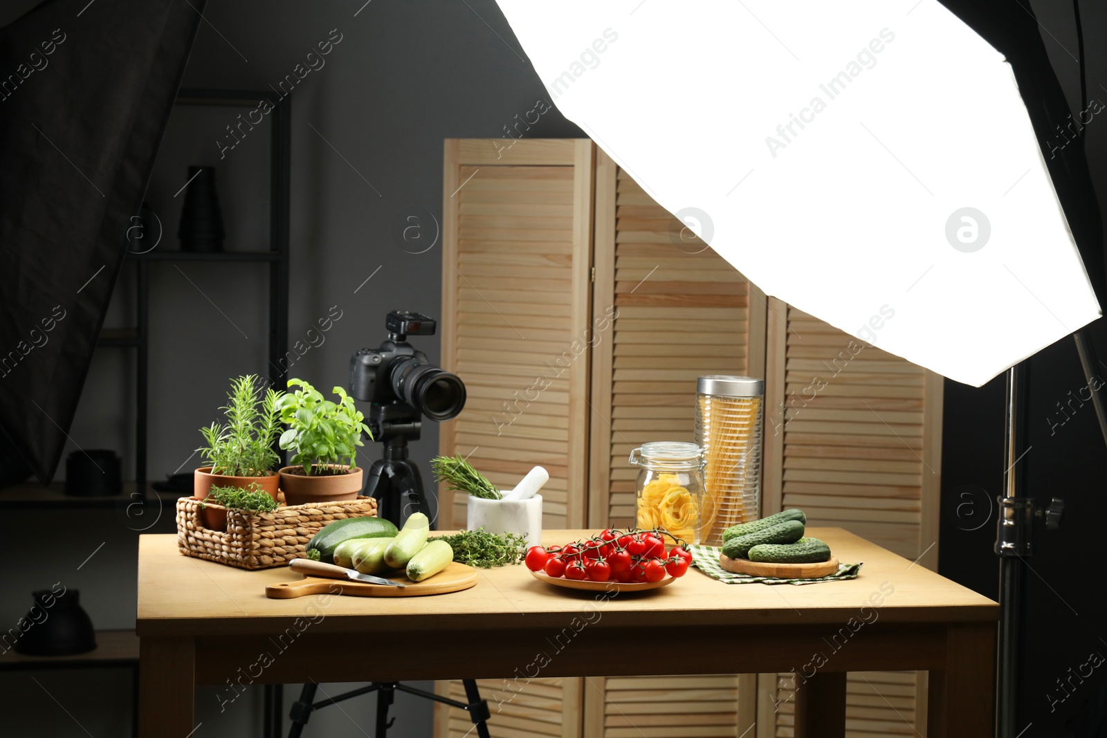 Photo of Shooting food in photo studio with professional lighting equipment