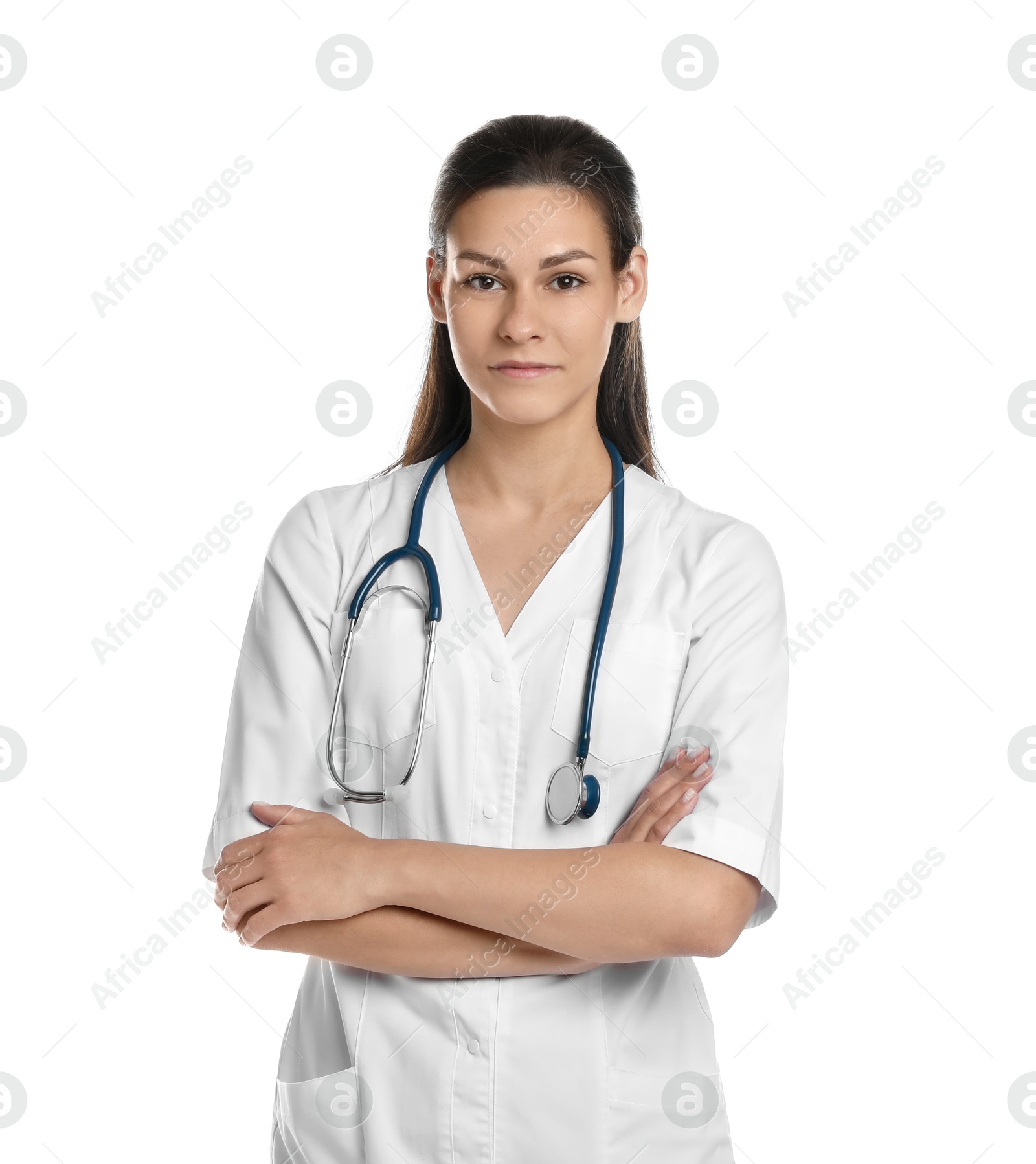 Photo of Portrait of beautiful nurse with crossed arms on white background