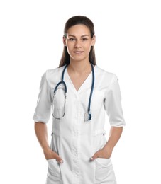 Portrait of smiling nurse with stethoscope on white background