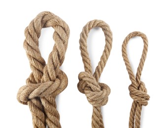 Photo of Hemp ropes with loops on white background, top view