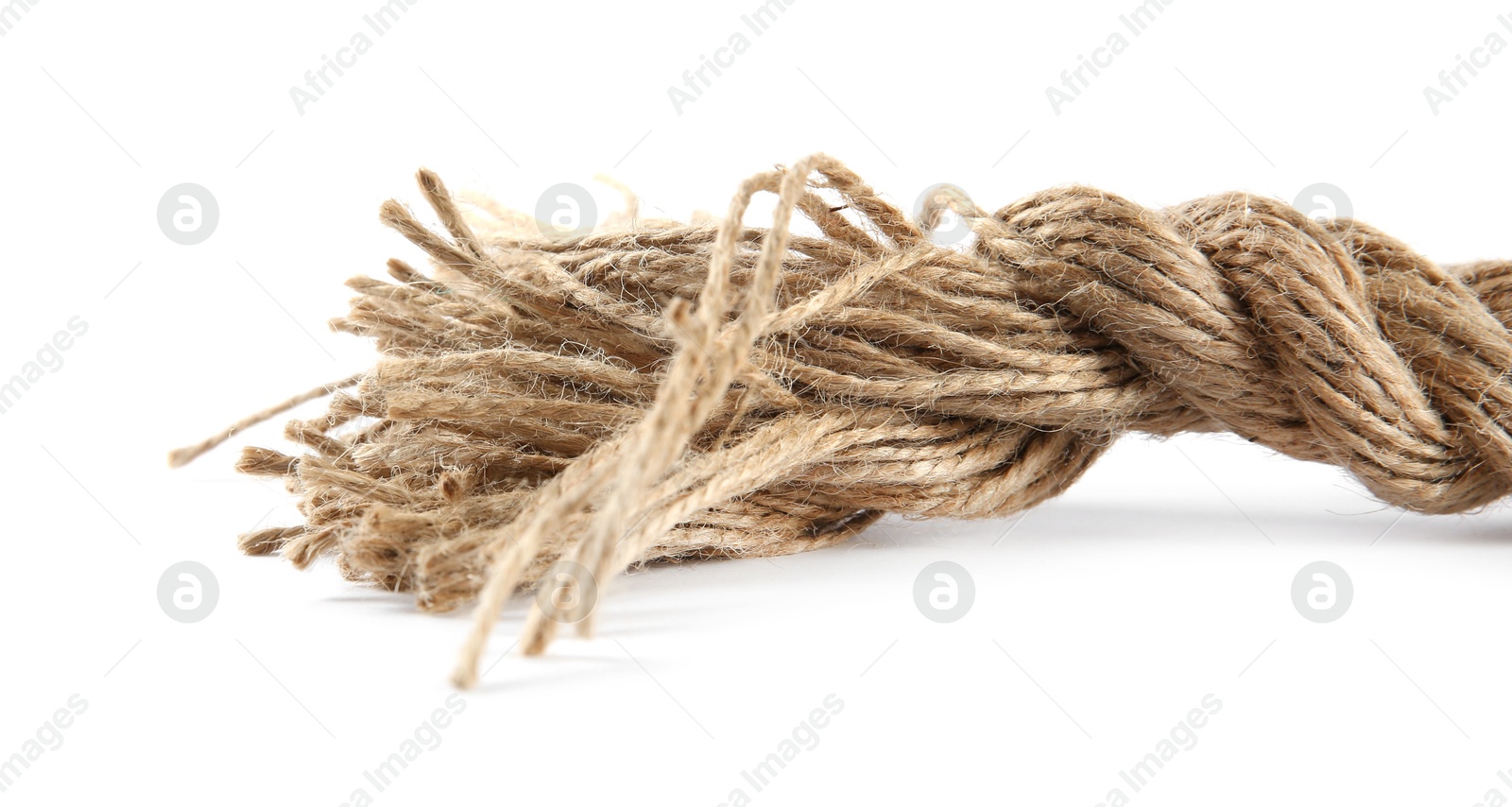 Photo of Hemp rope isolated on white. Organic material